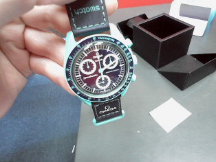 MONTRE OMEGA SWATCH EARTH reconditionné